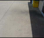 Greasy restaurant entrance before pressure washing Greasy restaurant entrance before pressure washing