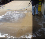 Greasy restaurant entrance being pressure washed Greasy restaurant entrance being pressure washed