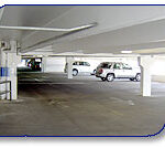 Parking garage at Heather Gardens pressure washed by Wash On Wheels