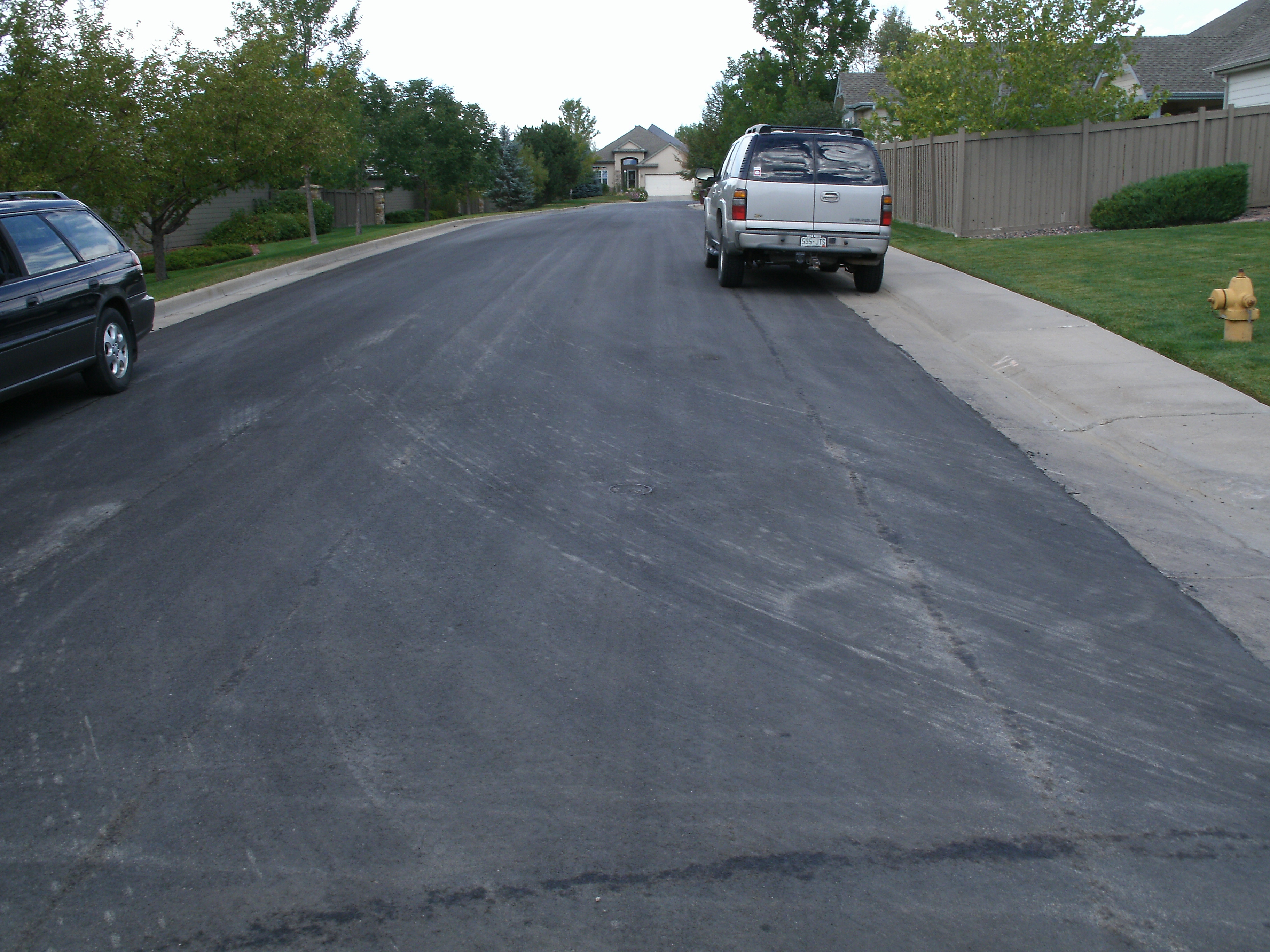 Pressure Washing a Hydraulic Spill From a Street Sweeper For The City