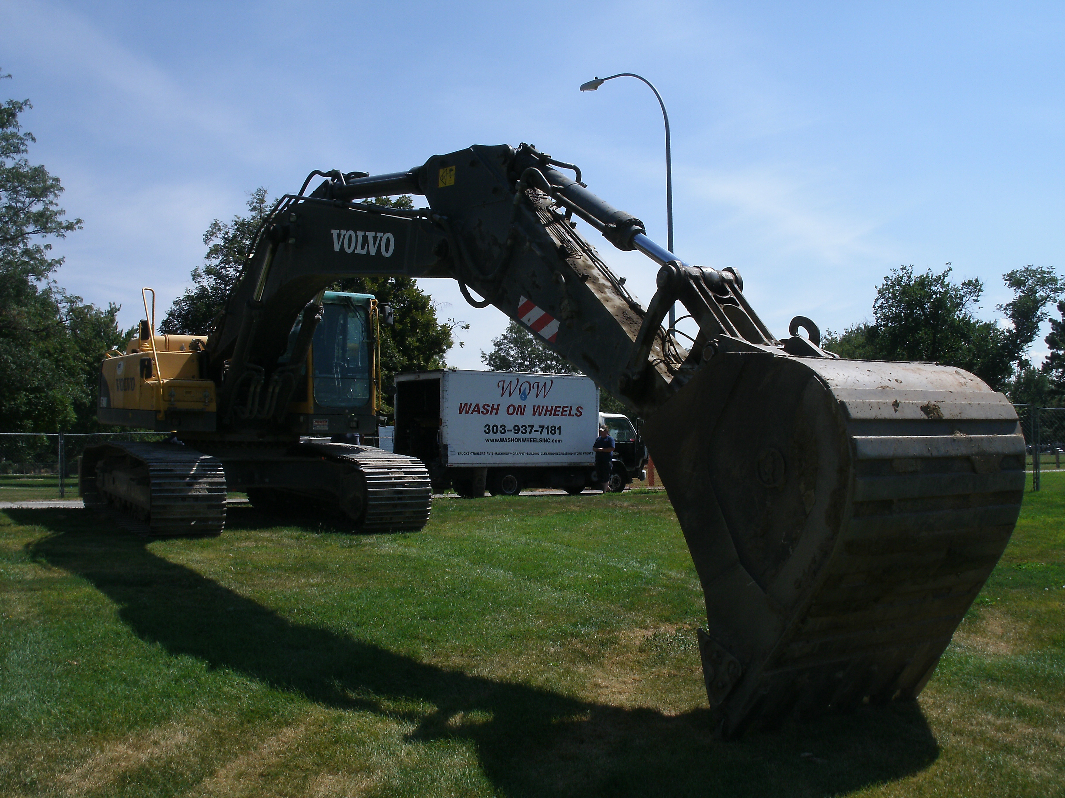 Pressure Washing Heavy Equipment At the Denver Museum Of Nature And